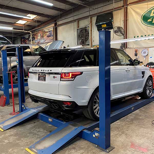 White Range Rover car in service center