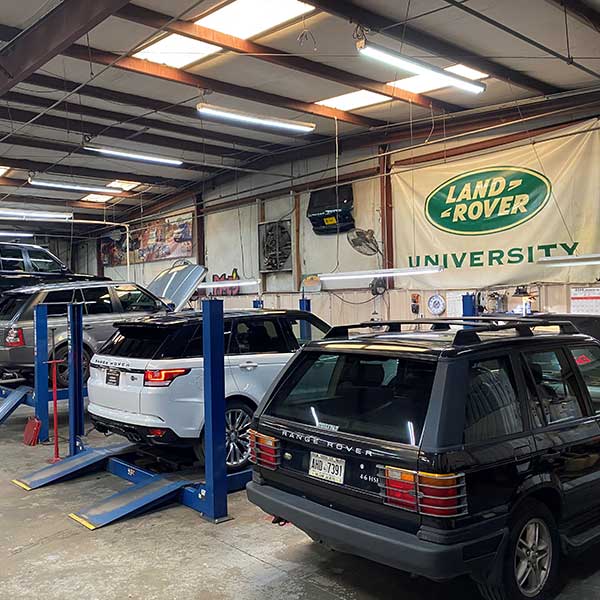 Range Rover cars in the gargae